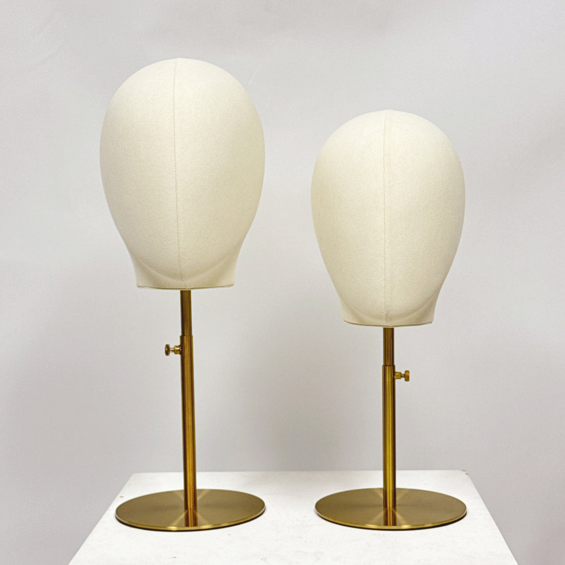 The Secret to Stunning Boutique Store Storefronts: Why JELIMATE Beige Microfiber Male Female Mannequin Head With Gold Round Base Are a Must-Have