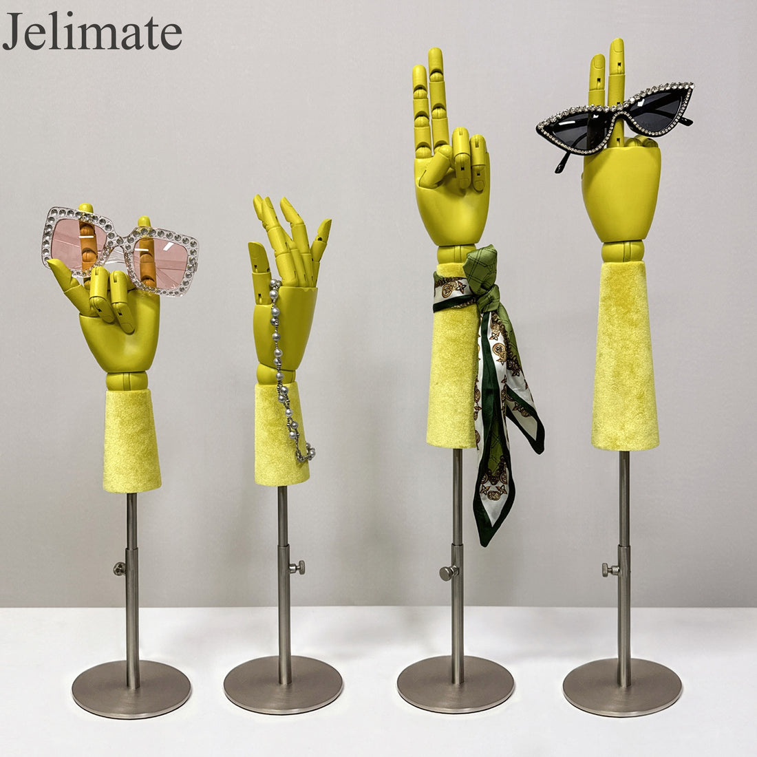 Why Jelimate Colorful Female Wooden Mannequin Hand With Velvet Handle With Silver Base is the Perfect Accent for Your Boutique Displays?