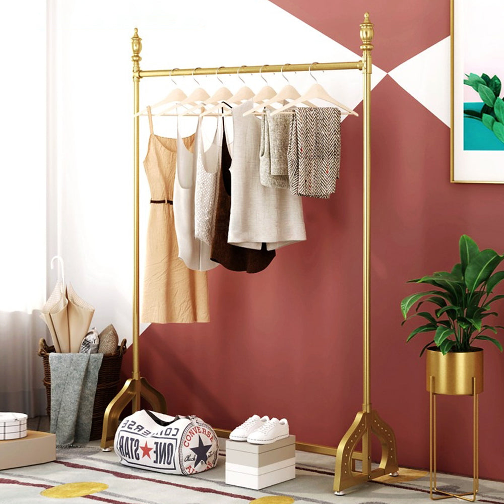 Gold garment discount rack with shelves