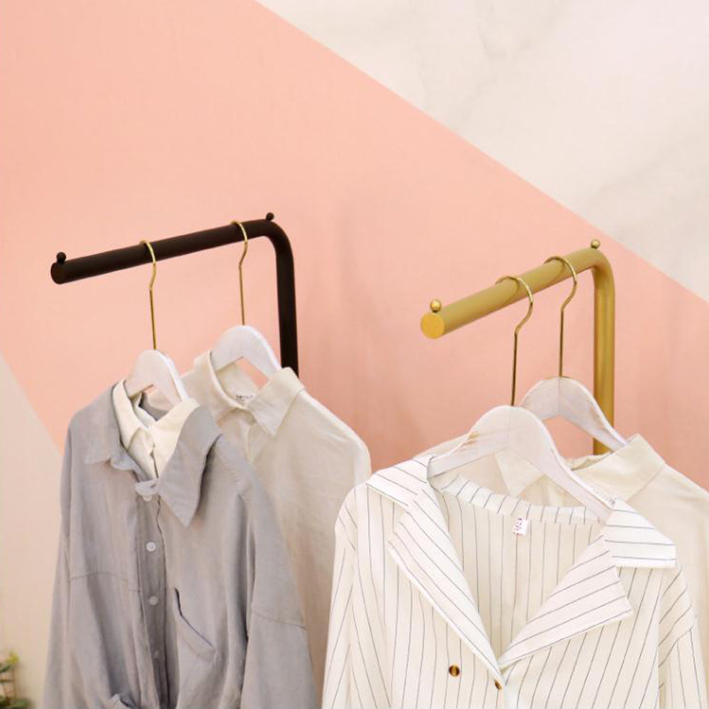 Pink clothes online rack